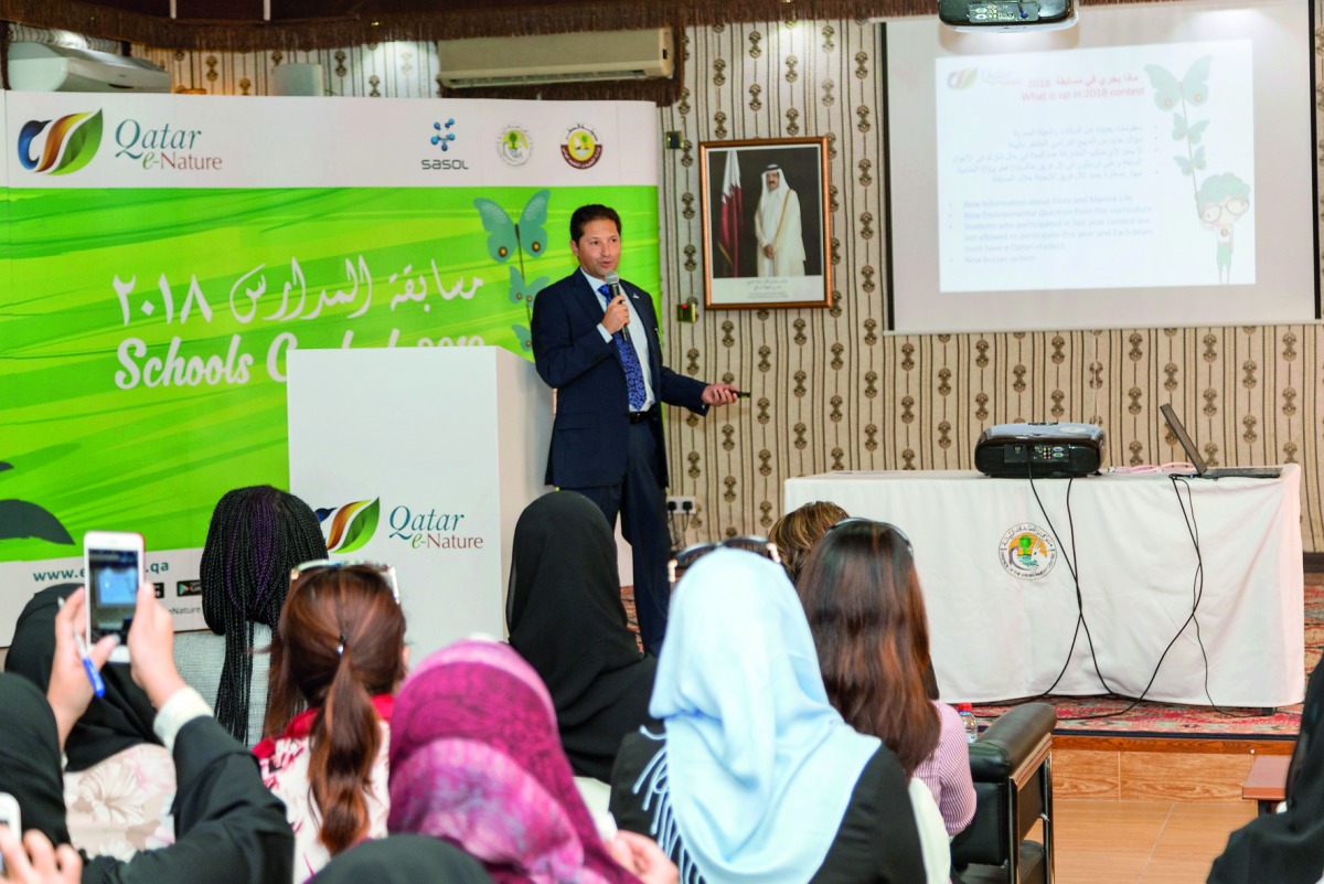 An official giving instructions to students at Qatar e-Nature Schools Contest. 
