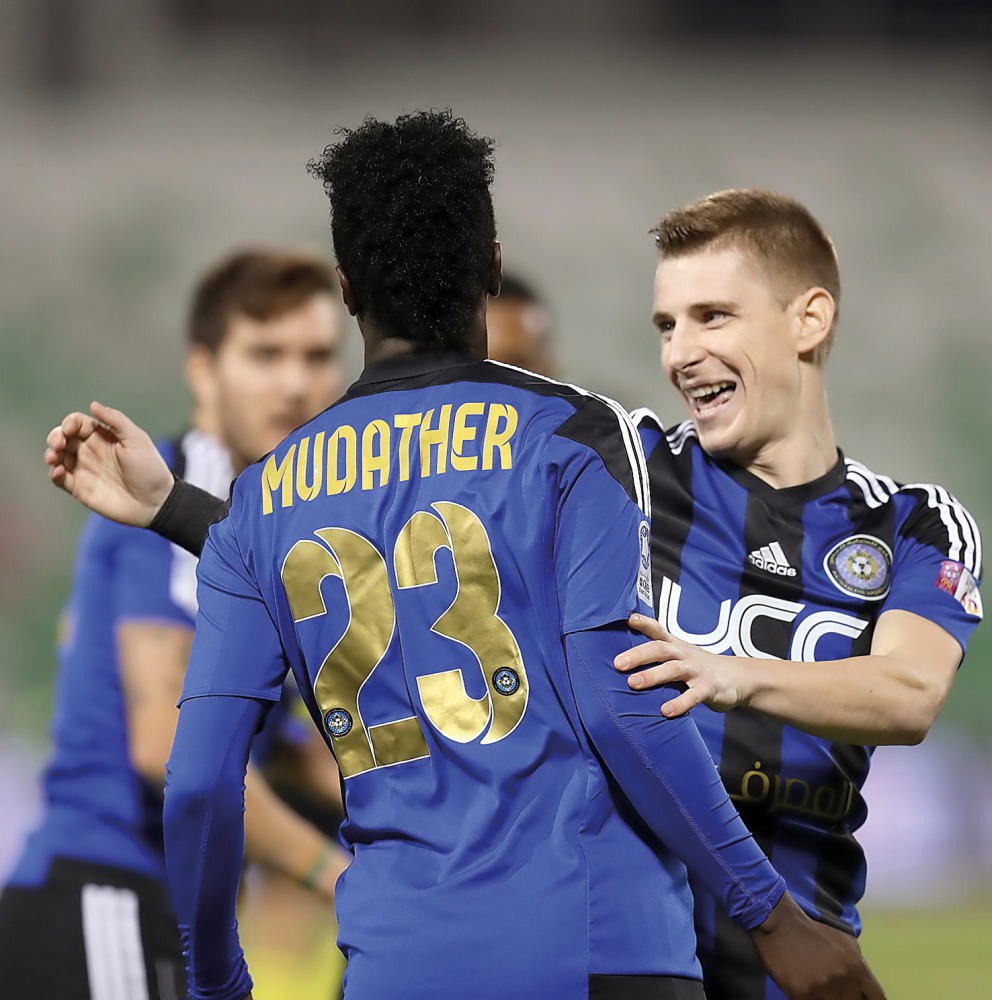 Al Sailiya players celebrate a goal against Al Duhail during their QSL match at Al Ahli Stadium yesterday. 