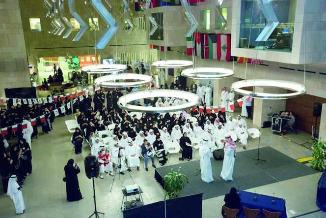 Performers entertaining audience during the Qatar National Day celebrations at Georgetown University in Qatar.