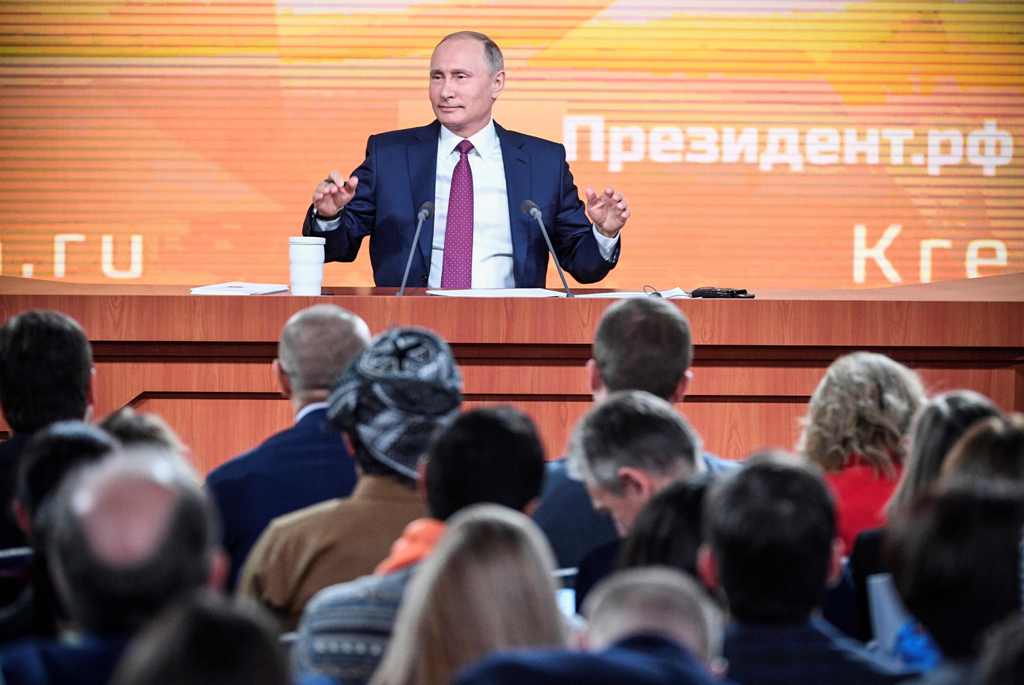 Russian President Vladimir Putin gives his annual press conference in Moscow on December 14, 2017. / AFP / Alexander NEMENOV