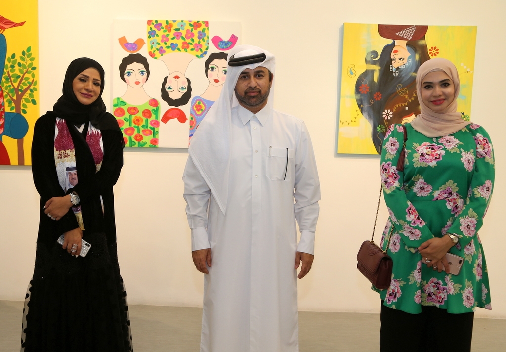 Katara General Manager Dr. Khalid bin Ibrahim Al Sulaiti with Qatari artist Lina Al Ali and Kuwaiti artist Anfal Al Yaquot.