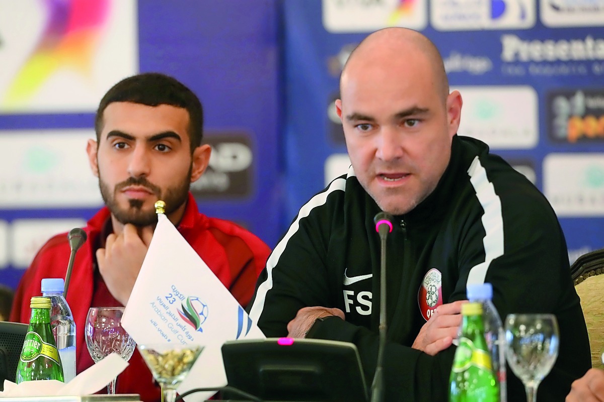 Qatar football coach Felix Sanchez (right) speaks while Qatar leftback Abdulkarim Al Ali looks on during a press conference ahead on the eve of their Gulf Cup match against Iraq yesterday. Pictures: Hussein Sayed