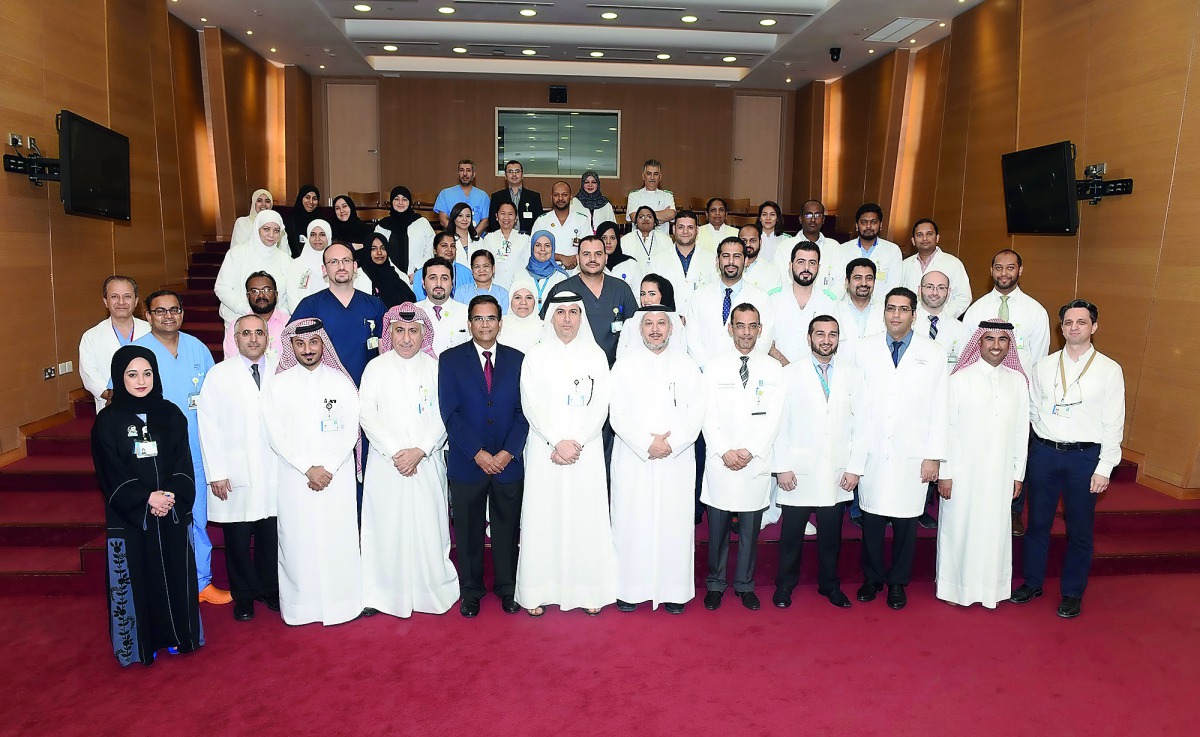 Dignitaries and clinicians from the ENT team at HMC’s new Ambulatory Care Center gather for a group photo.