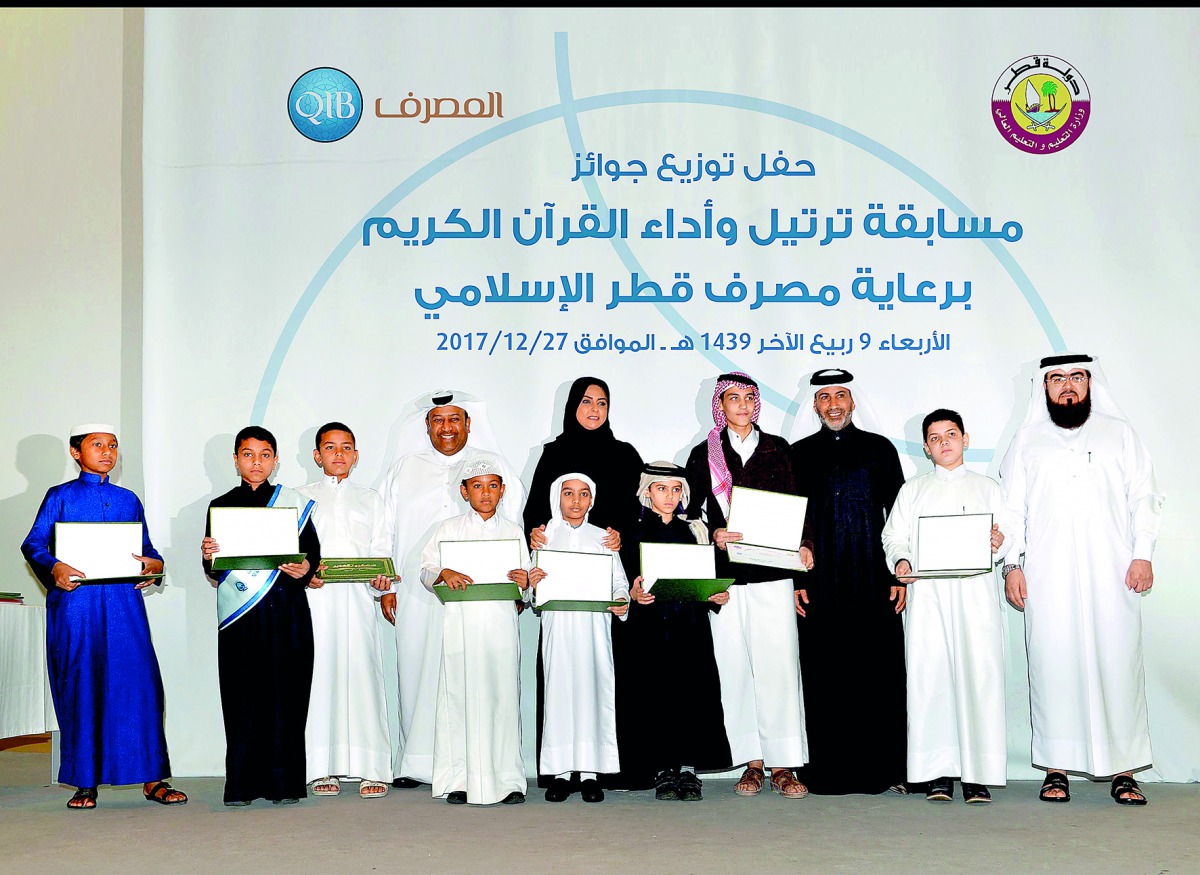 Fawzia Al Khater, Assistant Under-Secretary for Educational Affairs at the Ministry of Education and Higher Education; honouring students and Hassan Al Jafali Al Nuaimi, Assistant General Manager of Banking Services at Qatar Islamic Bank; and Hassan Al Ba