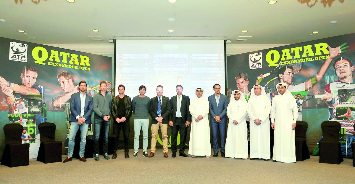 The players and officials pose for a photograph during the official draw ceremony of the Qatar Exxonmobil Open at Four Seasons Hotel yesterday. Pictures: Kamutty VP/The Peninsula