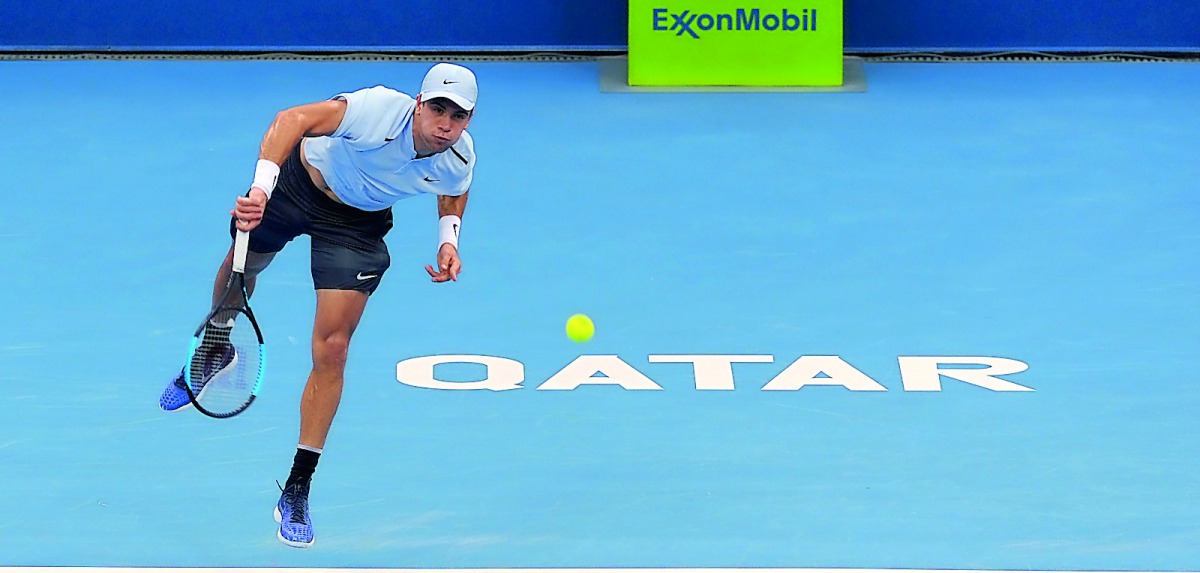 Borna Coric of Croatia returns the ball to Spanish tennis player Pablo Carreno Busta during the first round of the ATP Qatar ExxonMobil Open at the Khalifa International Tennis and Squash Complex in Doha yesterday. Pictures: Salim Matramkot/The Peninsula