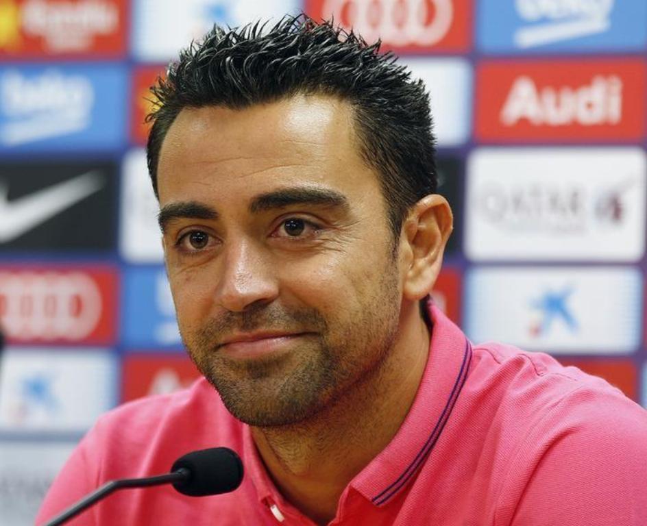 A file photo of Former Barcelona midfielder Xavi Hernandez. REUTERS/Gustau Nacarino 