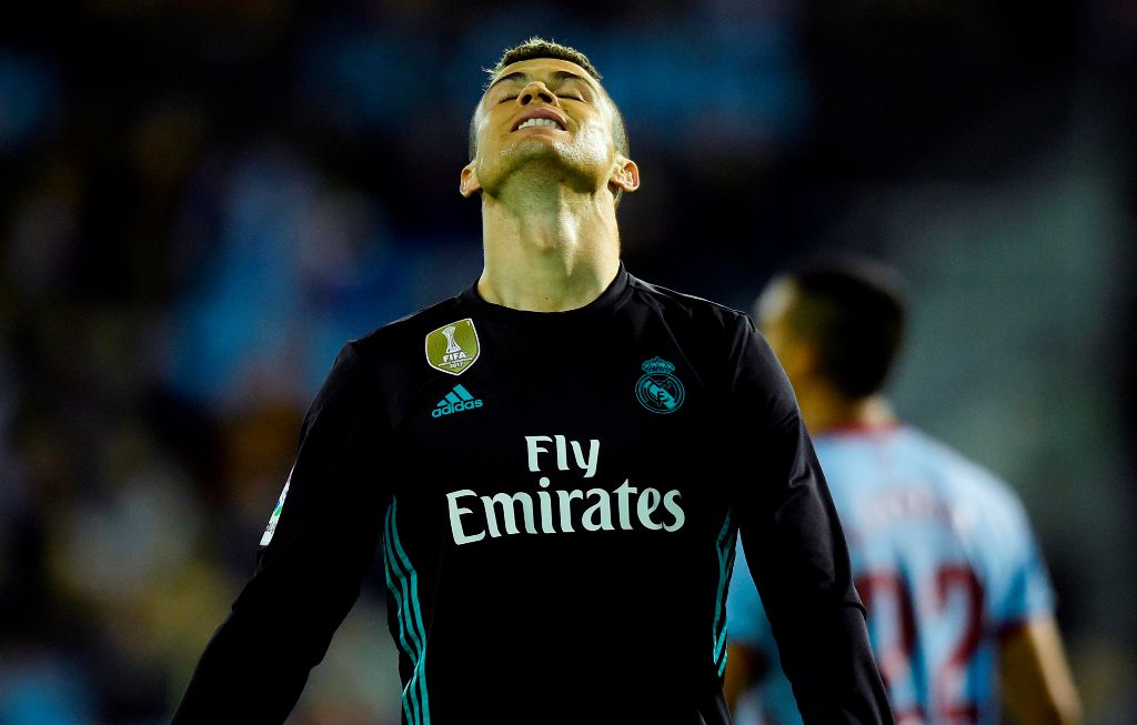 Real Madrid's Portuguese forward Cristiano Ronaldo reacts during the Spanish league football match Celta de Vigo vs Real Madrid at the Balaidos stadium in Vigo on January 7, 2018. / AFP / MIGUEL RIOPA
