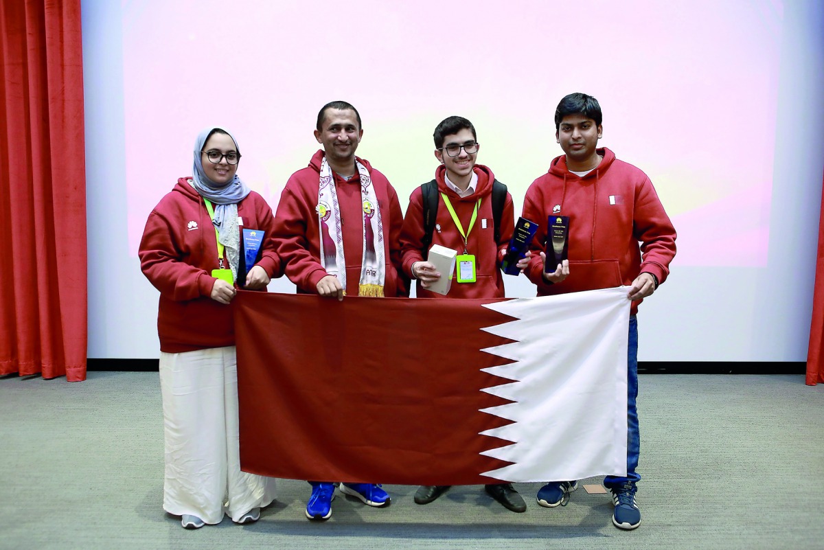 Qatar team members pose for a photograph at Huawei ICT Skill Competition Middle East. 