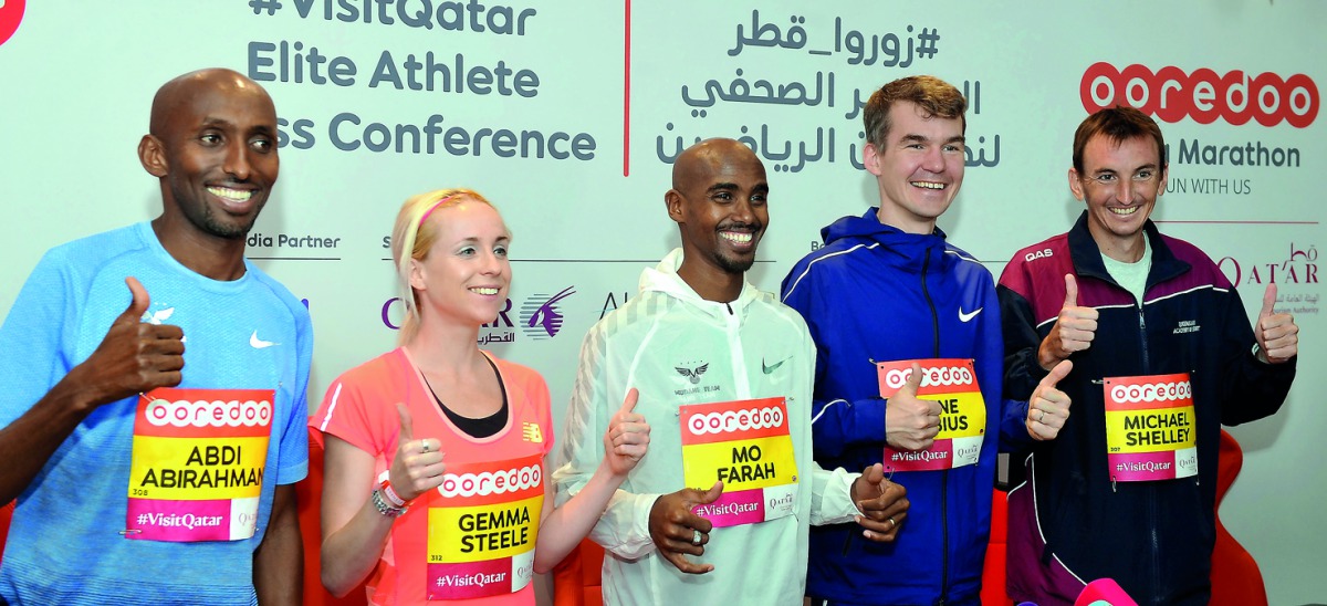 FROM LEFT: Marathoners Abdi Abdirahman, Gemma Steele, four-time Olympic champion Sir Mo Farah, Arne Gabius, and Michael Shelley pose for a photograph following a press conference ahead of the Ooredoo Doha Marathon at  Sheraton Park in Doha yesterday. Pic: