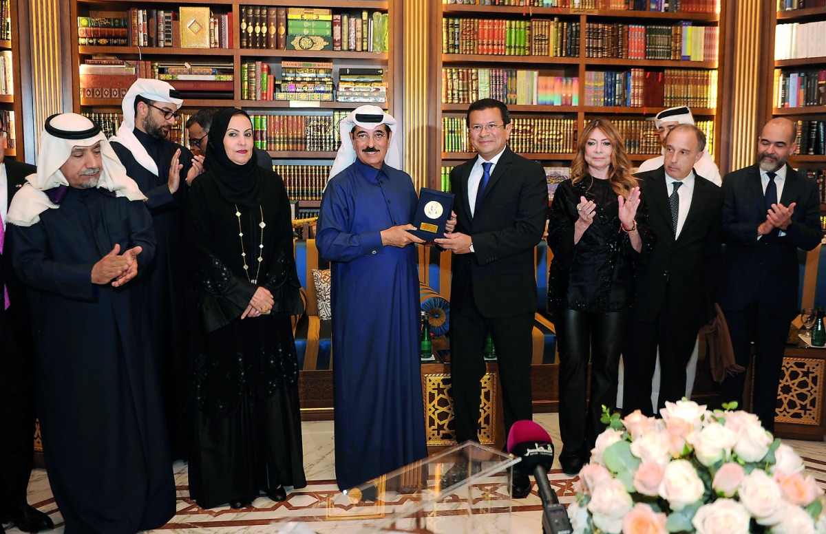H E Dr. Hamad bin Abdulaziz Al Kawari, Minister of State, receiving a Diplomatic Medal of Merit from El Salvador which was presented to him for his services by El Salvador’s Foreign Minister Hugo Martinez last night at Al Kawari’s residence. PIC: Abdul Ba