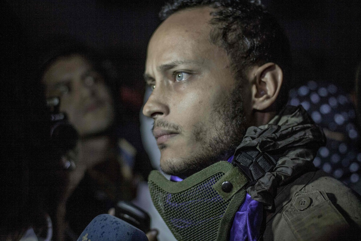 This file photo taken on July 13, 2017 shows Venezuelan police officer Oscar Perez participating in an anti-government protest in Caracas on July 13, 2017.  AFP / Inaki Zugasti