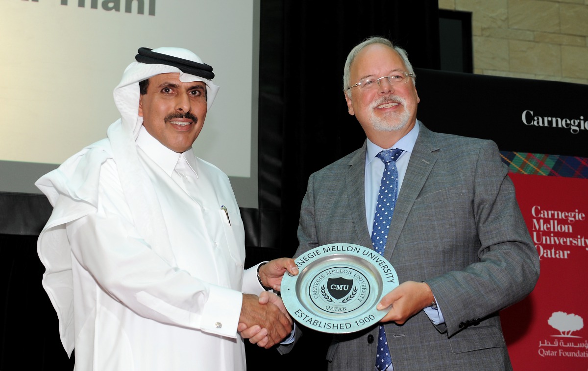 The Governor of Qatar Central Bank H E Sheikh Abdulla bin Saoud Al Thani (left), receiving a memento from the Dean of Carnegie Mellon University in Qatar (CMU-Q), Michael Trick, after the Governor delivered a lecture as part of the Dean’s Lecture Series o
