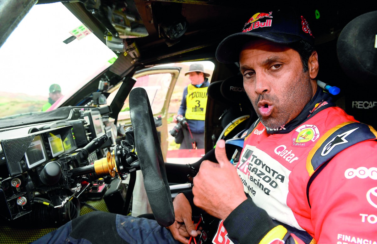 Toyota’s driver Nasser Al Attiyah of Qatar and his co-driver Matthieu Baumel of France compete during the 2018 Dakar Rally yesterday. 