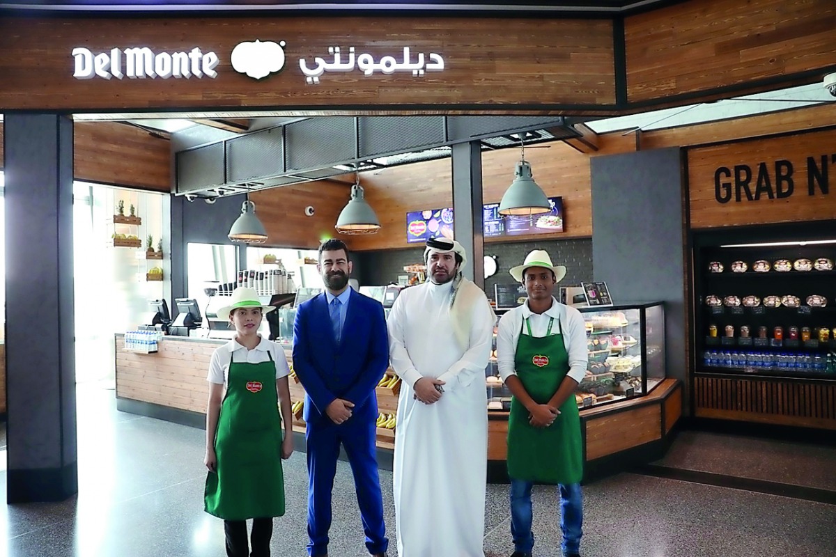 Officials and staff during the opening of the first Del Monte F&B store in Qatar at the airport. 