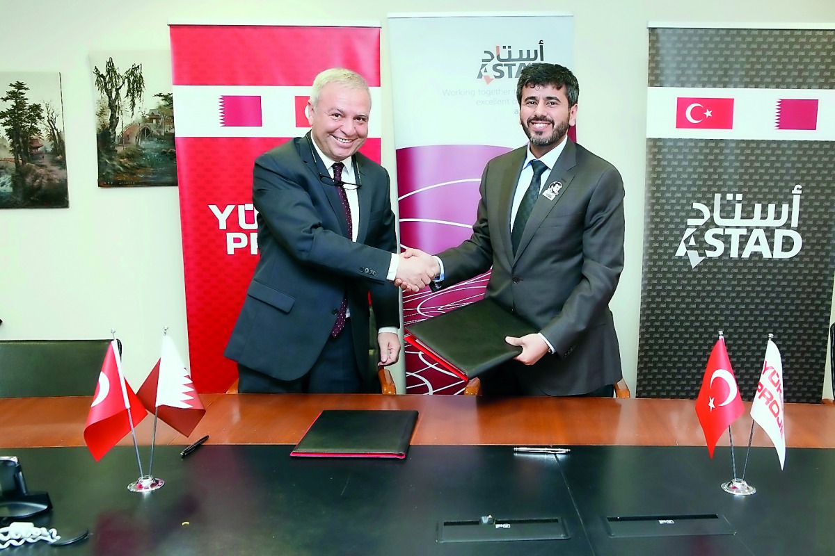 Ali Al Khalifa (right), ASTAD CEO shake hands with Celal AKIN, Chairman of Yüksel Proje, after signing the MoU at the Turkish firm’s headquarters in Ankara, Turkey. 