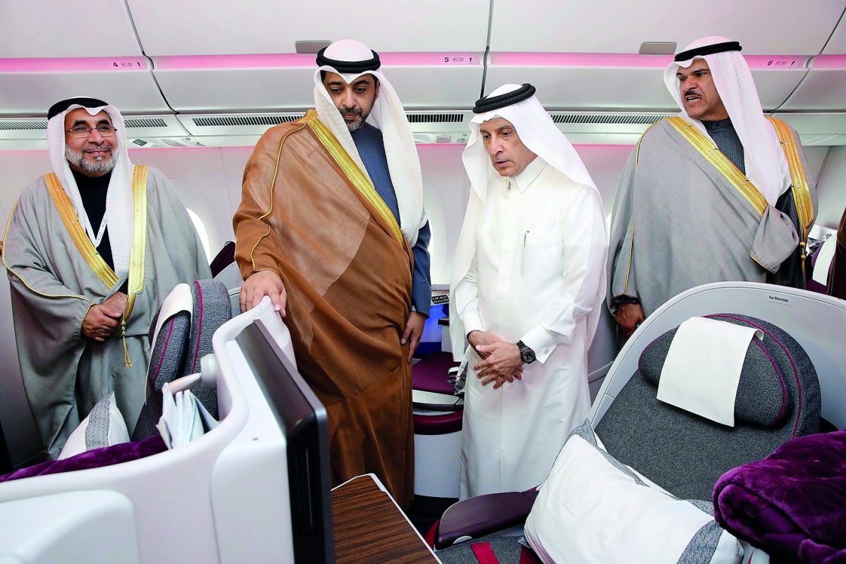 Qatar Airways Group Chief Executive, Akbar Al Baker, leading a VIP tour of the airline’s Qsuite-fitted Boeing 777.