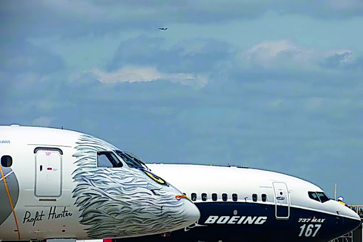 A Boeing 737 MAX and an Embraer E190-E2 are seen on the static display, before the opening of the 52nd Paris Air Show at Le Bourget airport near Paris, France, June 16, 2017. Reuters/Pascal Rossignol
