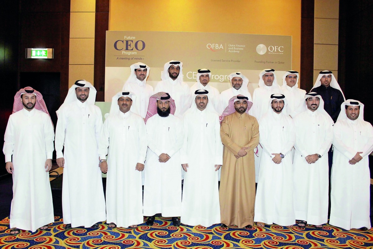 Nasser Ahmed Al Shaibi (second row, third right), Deputy Chairman of Qatar Finance and Business Academy (QFBA), and Yousuf Mohamed Al Jaida (second row, centre), Chief Executive Officer, QFC Authority, with QFBA officials and participants of the ‘Future C