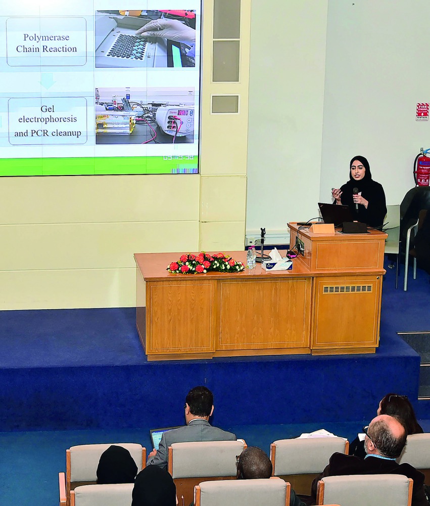 One of the students presenting her graduation research project.
