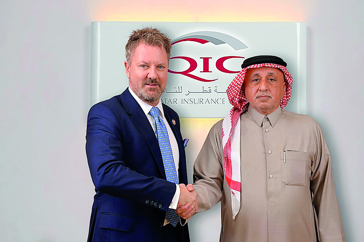 Khalifa Abdulla Turki Al Subaey (right), Group President & CEO of QIC Group with Kevin Spencer, founder and Chief Executive of for the Markerstudy Group.
