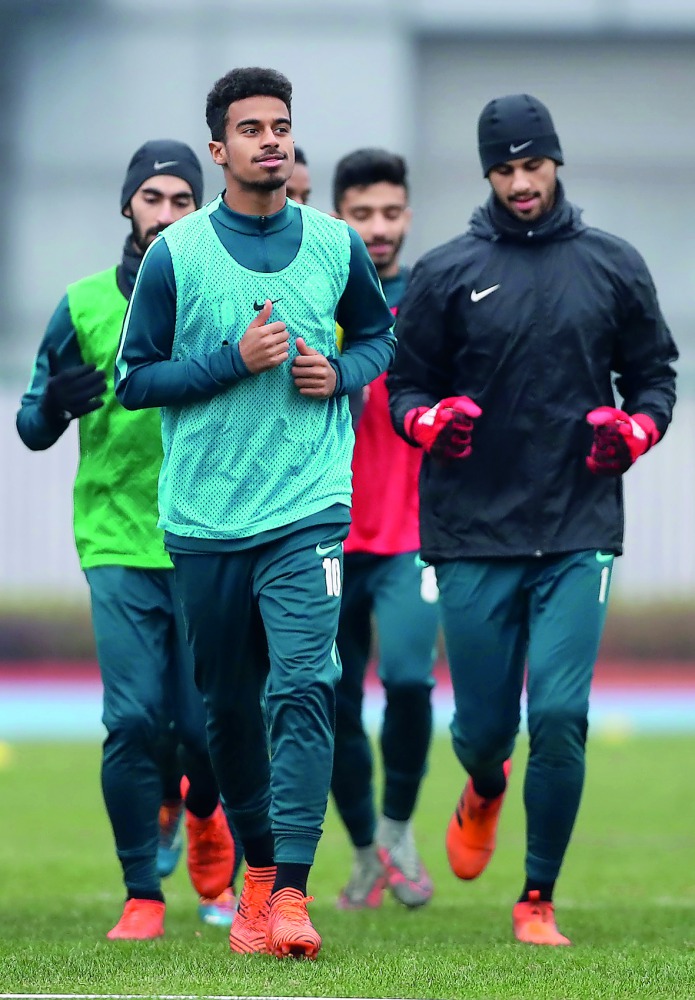 Akram Afif (foreground) eyes third spot for Qatar at AFC U23 Championship in China.