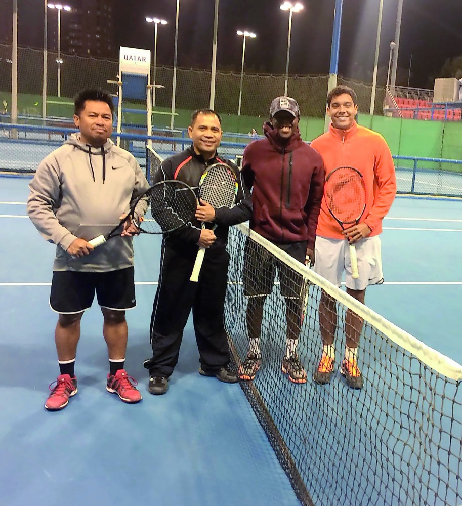 Cliff Acaso (second left) and Reynaldo Amazona  (left) the winners of the QTF Open 2018 doubles title are seen with runners-up Juan David Ramirez and Issa Shannan at the Khalifa International Tennis and Squash Complex.
