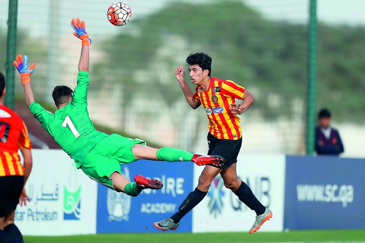 Action from the Al Kass Cup International match between Esperance Tunis and AC Milan at Aspire Academy training ground in Doha yesterday.