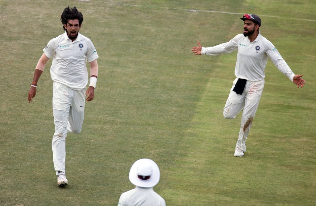 Ishant Sharma and Virat Kohli celebrate fall of the wicket of South Africa’s Faf Du Plessis. (REUTERS/James Oatway)
