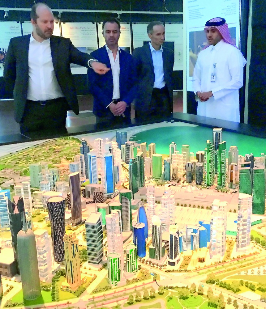 Engineer Abdulla Al Karani (right), Director of Urban Planning Department, briefing the delegation of Paris about urban planning at the Ministry of Municipality and Environment, yesterday.