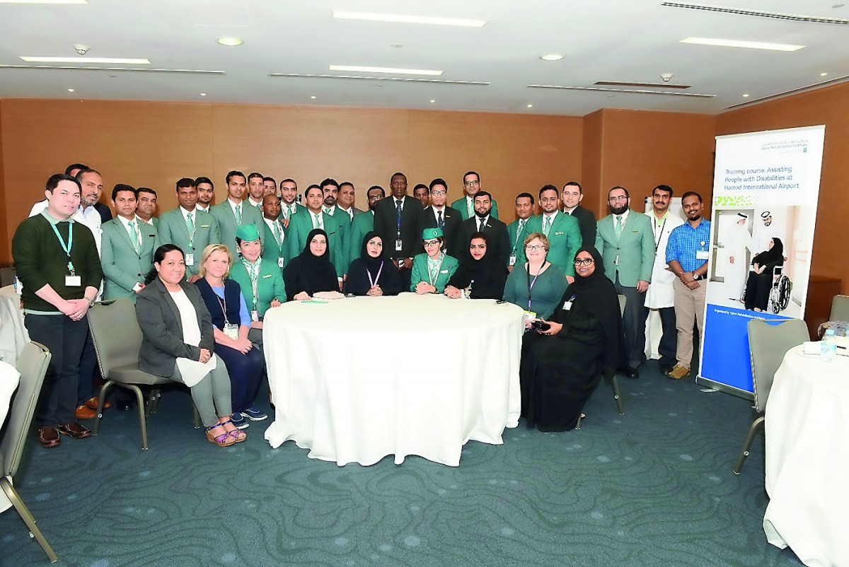 Staff of Qatar Rehabilitation Institute and Hamad International Airport during the training course on assisting passengers with disabilities. 