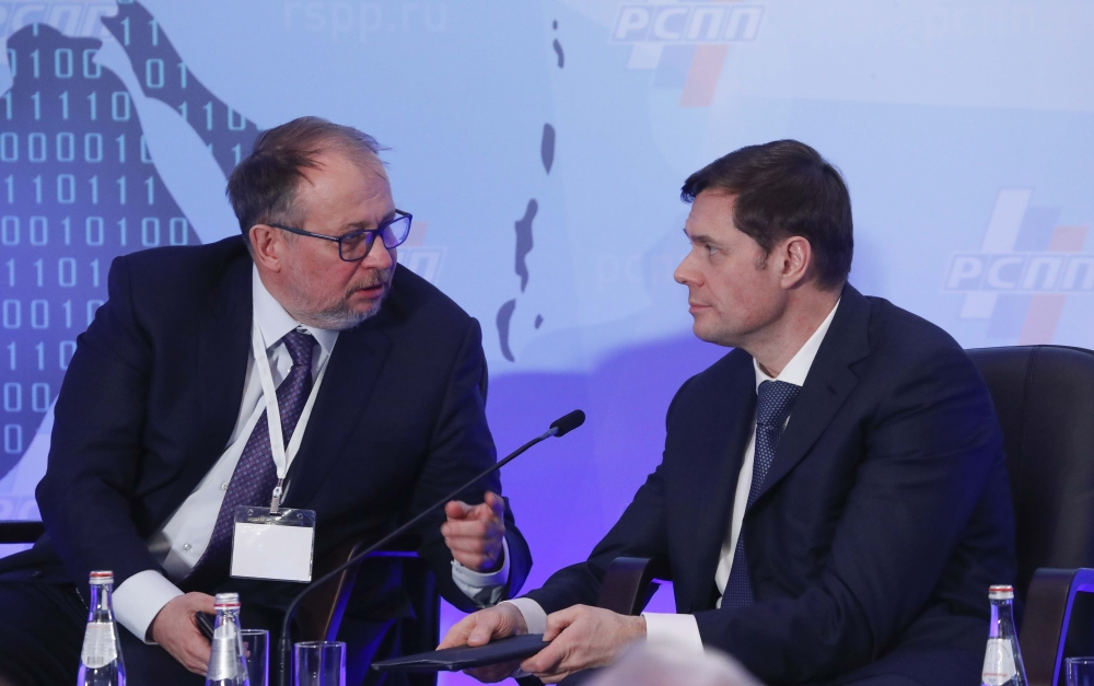 Russian tycoons Alexei Mordashov (R) and Vladimir Lisin attend a session during the Week of Russian Business, organized by the Russian Union of Industrialists and Entrepreneurs (RSPP), in Moscow, Russia February 9, 2018. Reuters/Sergei Karpukhin