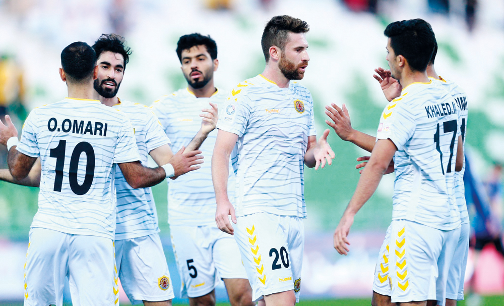 Qatar SC players celebrate after winning their QNB Stars League match against Al Sailiya yesterday.