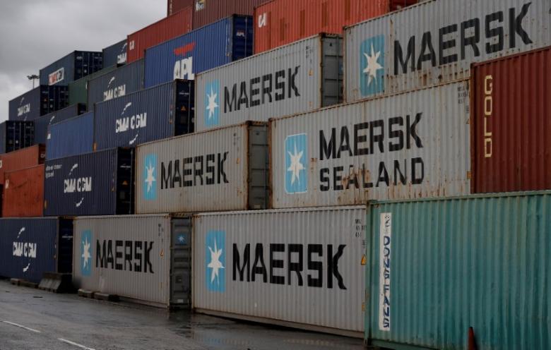 Empty Maersk shipping containers are seen stacked at Peel Ports container terminal in Liverpool northern England, December 9, 2016. Reuters/Phil Noble