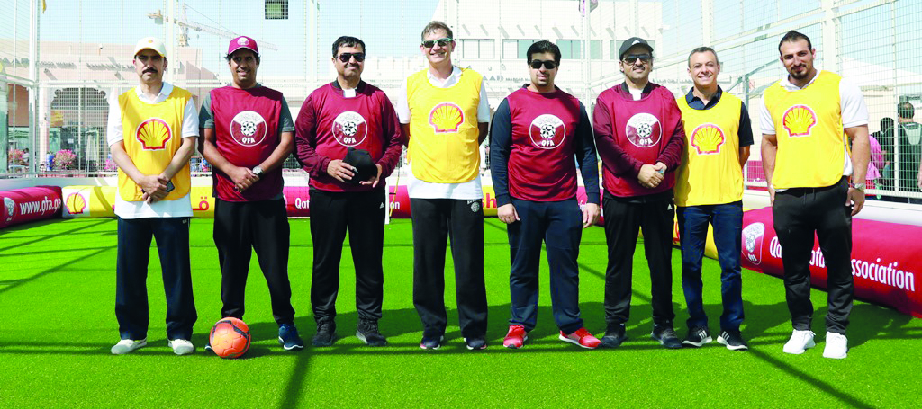 HE Dr Mohammed bin Saleh Abdulla Al Sada, Minister of Energy & Industry, Andrew Faulkner, Managing Director and Chairman of Qatar Shell, Khalid Al Kuwari, Director of Marketing and Communications at QFA and Qatar Shell officials celebrate the National Spo
