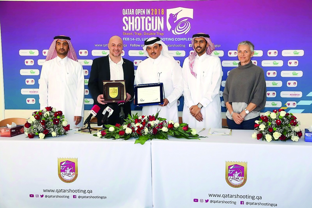 Qatar Shooting and Archery Association (QSAA) President Ali Mohammed Al Kuwari Antonella, Competition Director and other officials pose for a photograph during a 2018 Qatar Open Shotgun Championship press conference at Losail Shooting Range yesterday.