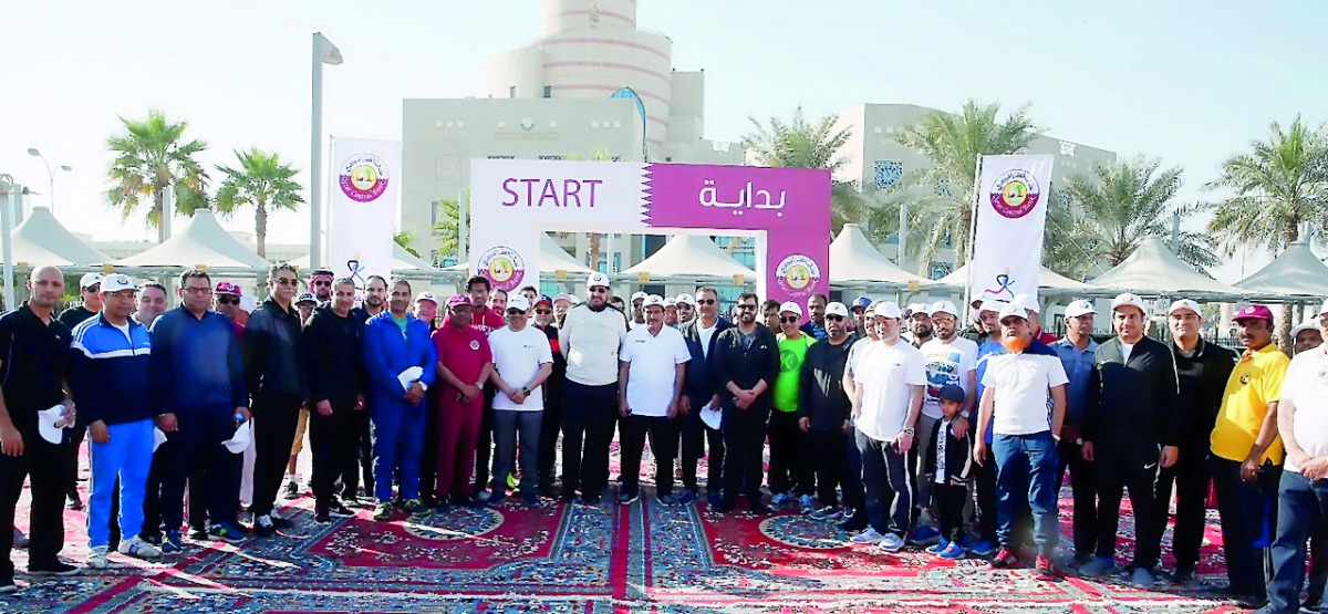 Doha Bank employees with others during the activities organised by Qatar Central Bank to commemorate National Sport Day. 
