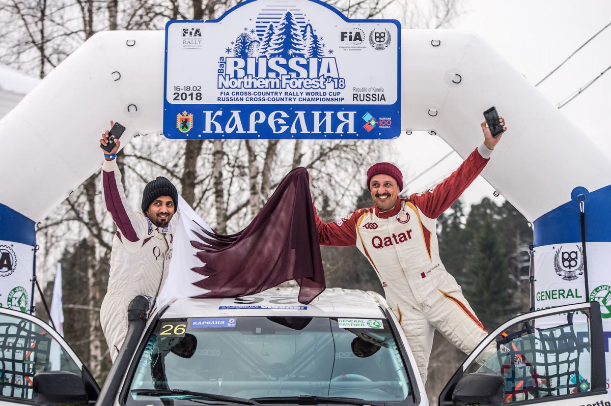 Qatar’s Adel Abdulla  (right) and Nasser Al Kuwari celebrate after the race.