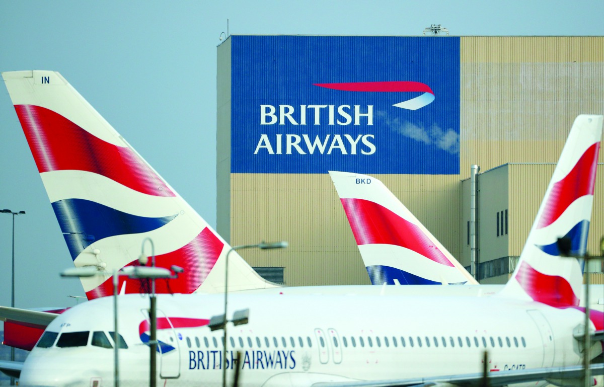British Airways aircraft are seen at Heathrow Airport in west London, Britain, February 23, 2018. Reuters/Hannah McKay