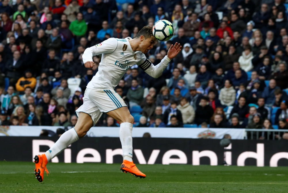 Real Madrid’s Cristiano Ronaldo heads at goal. (REUTERS/Juan Medina)