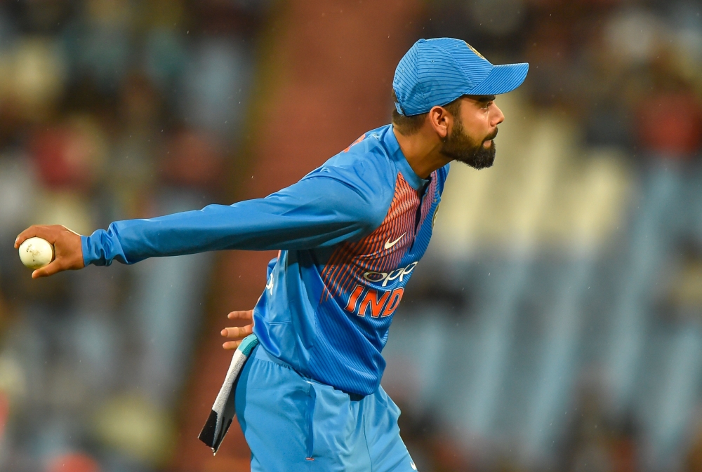 India's Virat Kohli throws a ball during the second T20 cricket match between South Africa and India at Super Sport Park Stadium in Pretoria on February 21, 2018. AFP / Christiaan Kotze