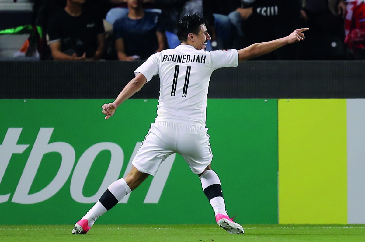 Al Sadd’s Bhagdad Bounedjah celebrates after scoring a goal.