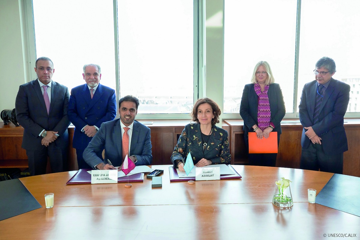 H E Khalifa bin Jassim Al Kuwari, Director General of the Qatar Fund for Development and Audrey Azoulay, Unesco Director-General,  with other officials during the signing ceremony to supplement the finance of “Heritage Emergency Fund” with $2m. 