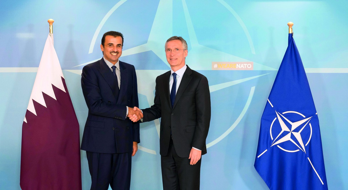 Emir H H Sheikh Tamim bin Hamad Al Thani meeting with Nato Secretary-General Jens Stoltenberg at Nato headquarters in Brussels yesterday.
