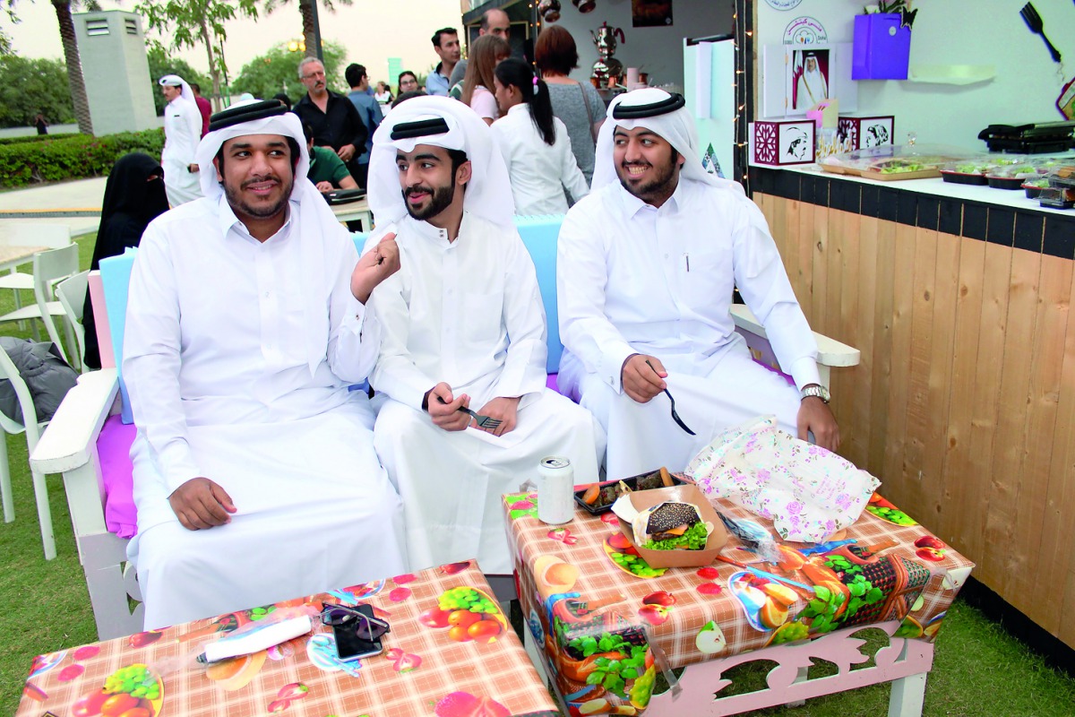 The members of Nama Center at its stall at the ninth annual Qatar International Food Festival 2018 at the Sheraton Hotel Park.