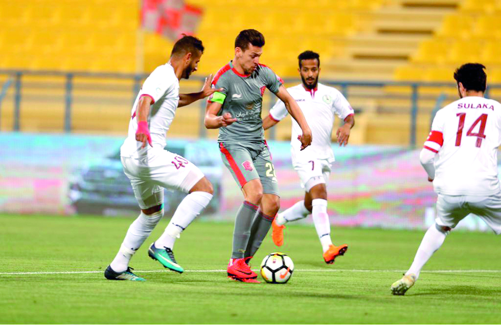 Action from the match between Al Duhail and Al Markhiya at Al Gharafa Stadium yesterday.