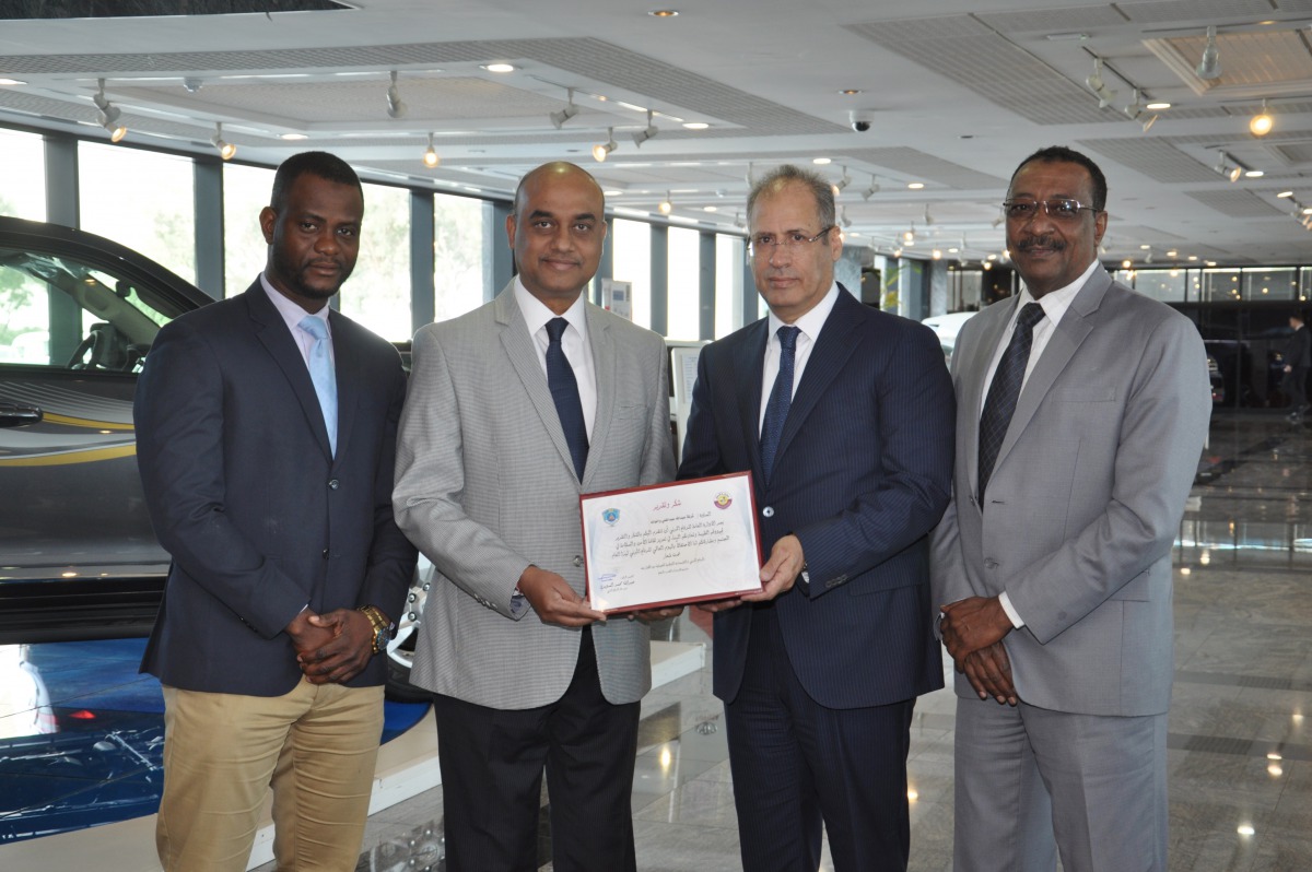 R K Murugan, AAB’s Acting CEO & COO - Automotive Division; Imad Hamzeh, Real Estate Director, pose with the award. 