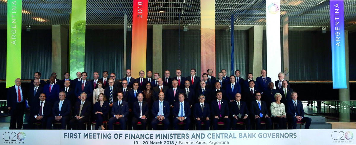 Finance ministers and Central Bank presidents pose for the official photo at the G20 Meeting of Finance Ministers in Buenos Aires, Argentina, March 19, 2018. Reuters/Marcos Brindicci