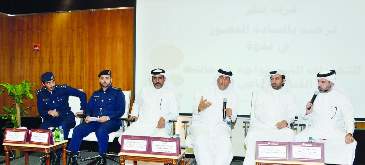 Ali Abdul Latif Al Misnad (third right), Board Member, Qatar Chamber addressing the seminar session along with other officials from various ministries.