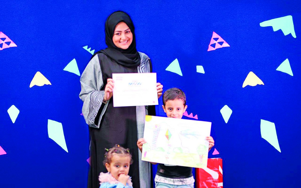 A child displaying the poster.